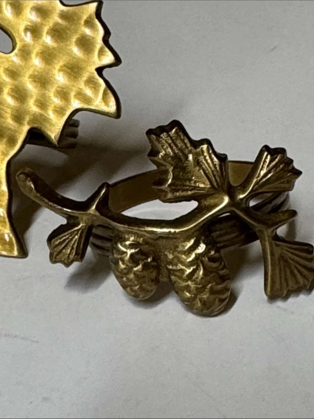 brass moose and pinecone and branch napkin rings set of 4